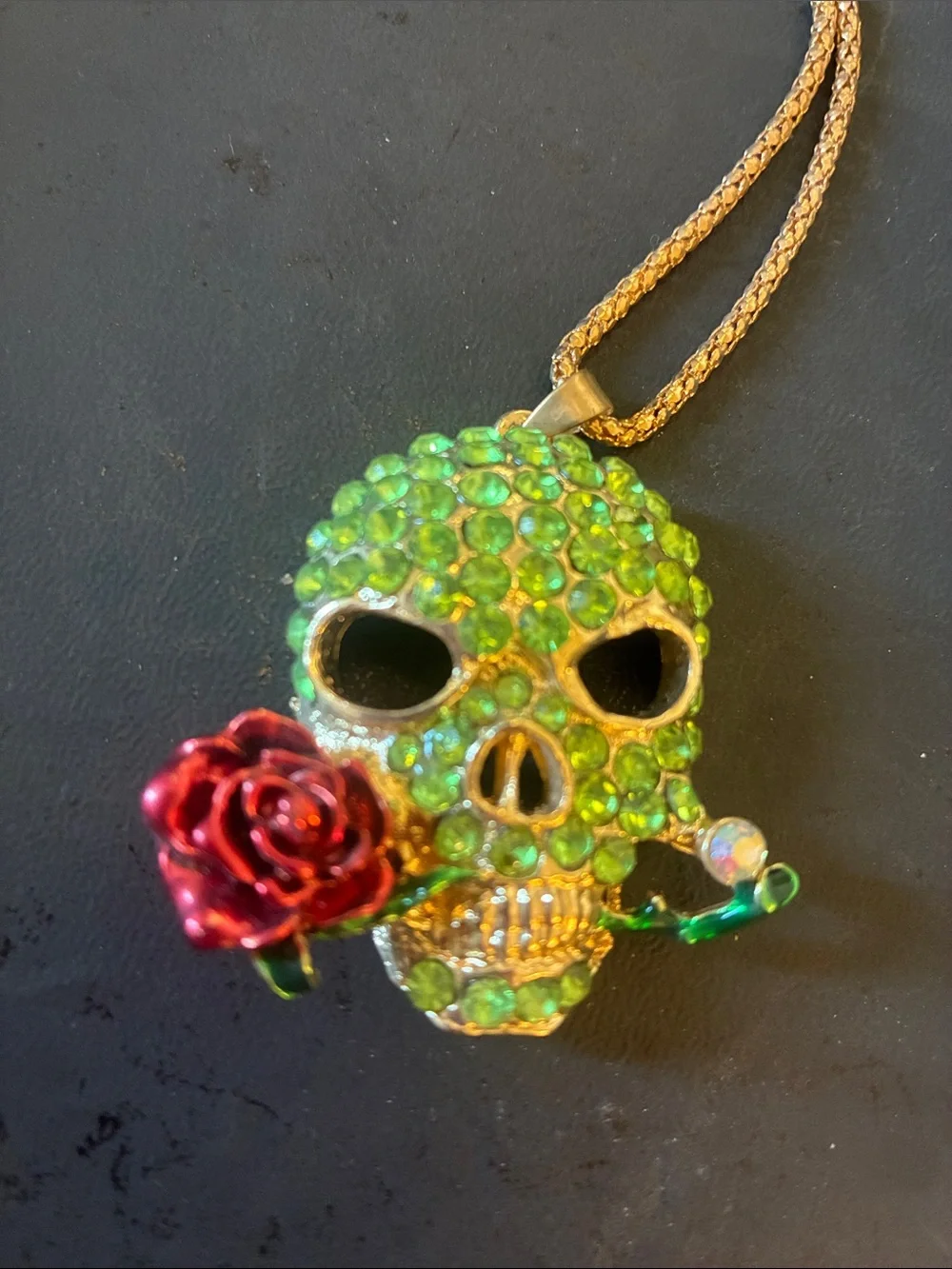 Green Crystal Skull Pendant Necklace with Red Rose Accent